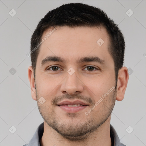 Joyful white young-adult male with short  brown hair and brown eyes