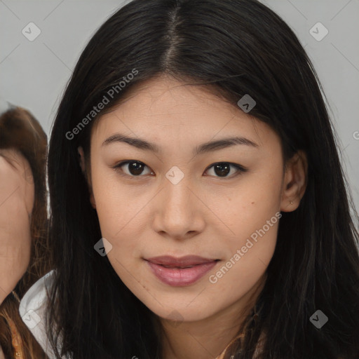 Joyful asian young-adult female with long  brown hair and brown eyes