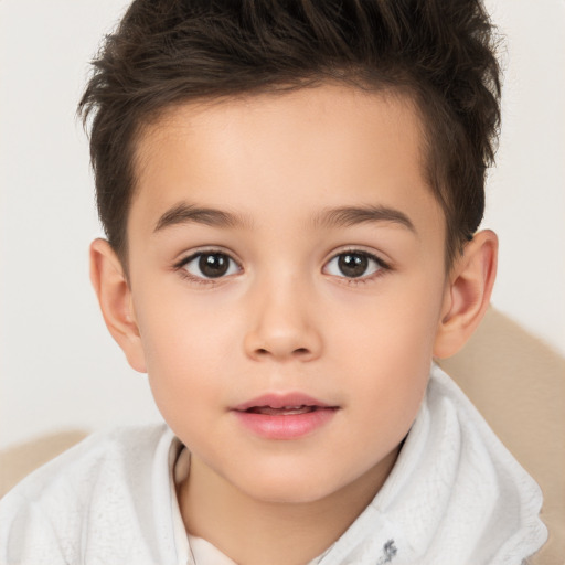 Joyful white child female with short  brown hair and brown eyes