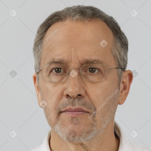 Neutral white middle-aged male with short  gray hair and brown eyes