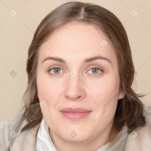 Joyful white young-adult female with medium  brown hair and blue eyes