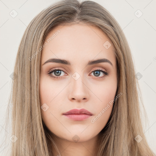 Neutral white young-adult female with long  brown hair and brown eyes