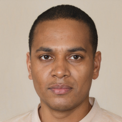 Neutral black young-adult male with short  black hair and brown eyes
