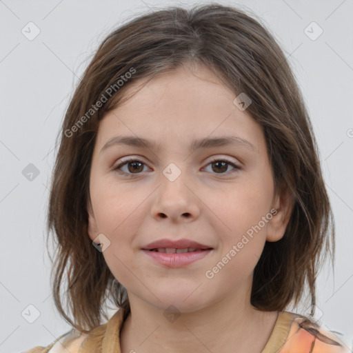 Joyful white child female with medium  brown hair and brown eyes