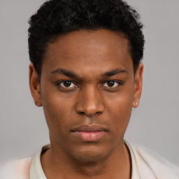 Neutral black young-adult male with short  brown hair and brown eyes