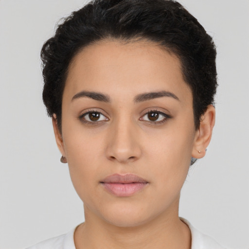 Neutral latino young-adult female with short  black hair and brown eyes