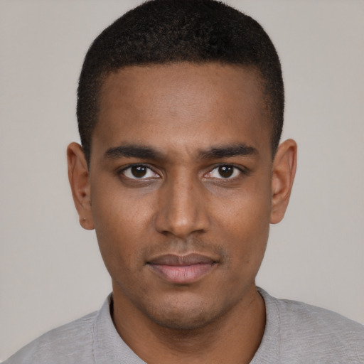 Neutral black young-adult male with short  black hair and brown eyes
