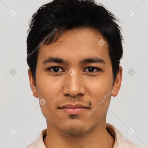 Joyful asian young-adult male with short  black hair and brown eyes