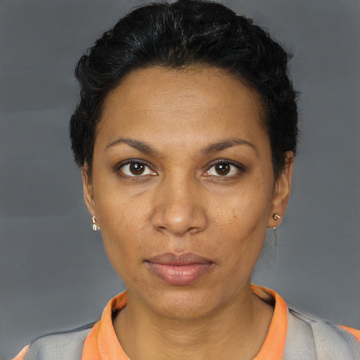 Neutral black adult female with short  brown hair and brown eyes