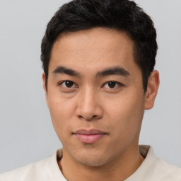 Neutral asian young-adult male with short  black hair and brown eyes