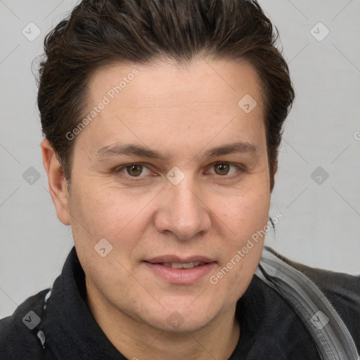 Joyful white adult male with short  brown hair and grey eyes