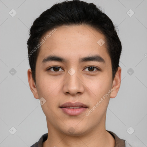 Joyful white young-adult male with short  black hair and brown eyes