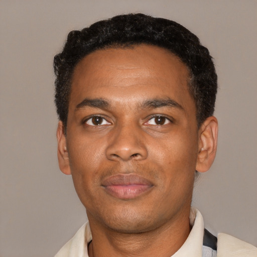 Neutral black young-adult male with short  black hair and brown eyes