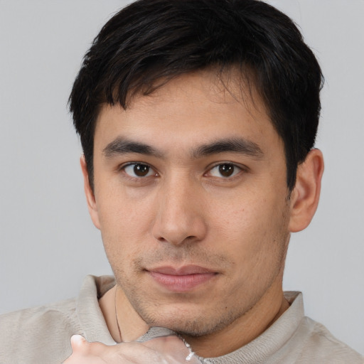 Neutral asian young-adult male with short  brown hair and brown eyes