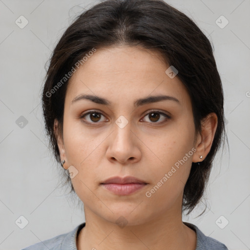 Neutral white young-adult female with medium  brown hair and brown eyes