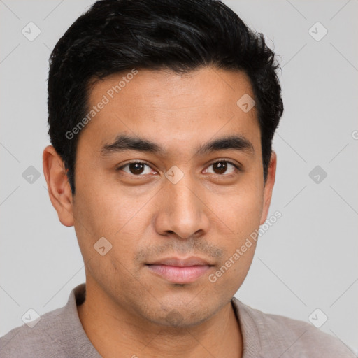 Neutral latino young-adult male with short  black hair and brown eyes