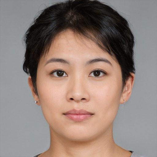 Neutral asian young-adult female with short  brown hair and brown eyes