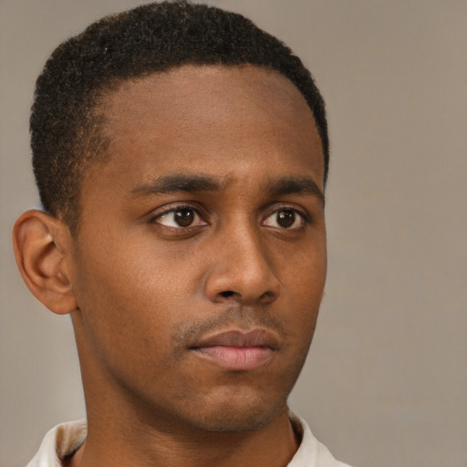 Neutral latino young-adult male with short  brown hair and brown eyes