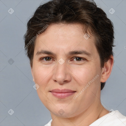 Joyful white adult female with short  brown hair and brown eyes