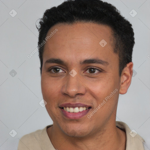 Joyful latino young-adult male with short  black hair and brown eyes