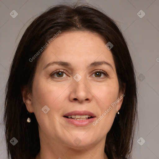 Joyful white adult female with medium  brown hair and brown eyes