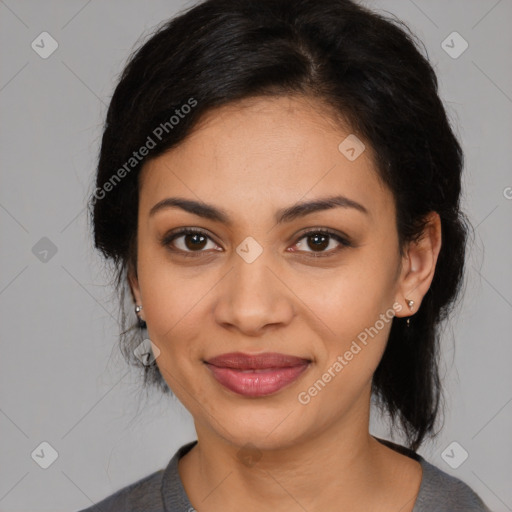 Joyful latino young-adult female with medium  black hair and brown eyes