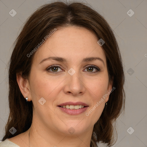 Joyful white adult female with medium  brown hair and brown eyes