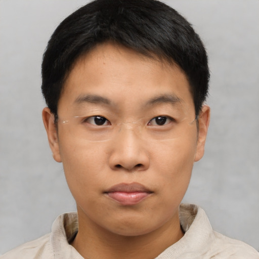 Neutral asian young-adult male with short  brown hair and brown eyes