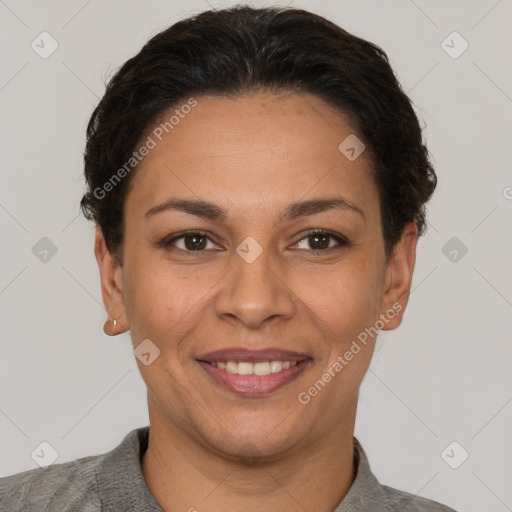 Joyful white adult female with short  brown hair and brown eyes