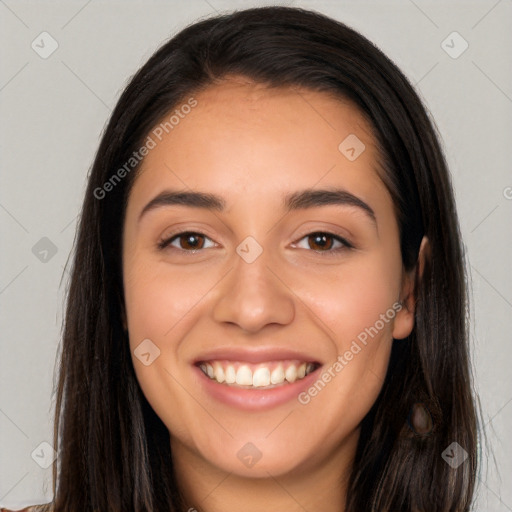 Joyful white young-adult female with long  black hair and brown eyes