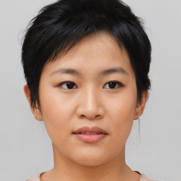 Neutral asian young-adult female with medium  brown hair and brown eyes