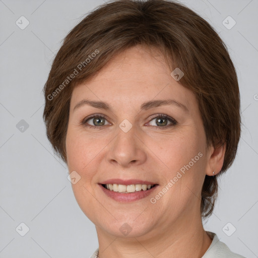 Joyful white young-adult female with short  brown hair and grey eyes