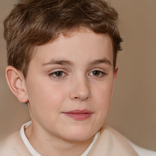 Joyful white child male with short  brown hair and brown eyes