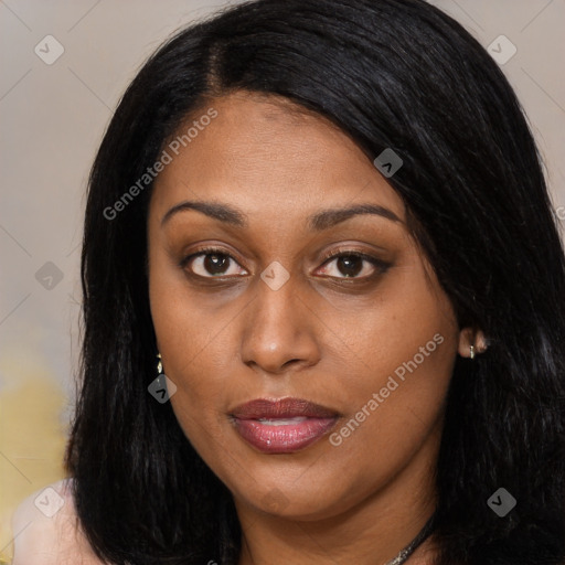 Joyful latino young-adult female with long  brown hair and brown eyes