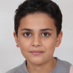 Joyful white child female with short  brown hair and brown eyes