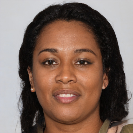 Joyful latino young-adult female with medium  black hair and brown eyes