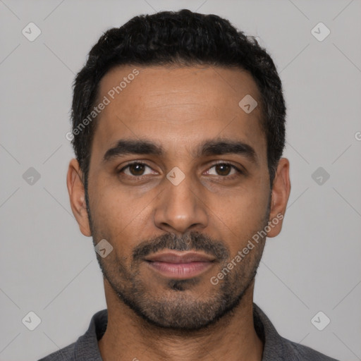 Neutral latino young-adult male with short  black hair and brown eyes