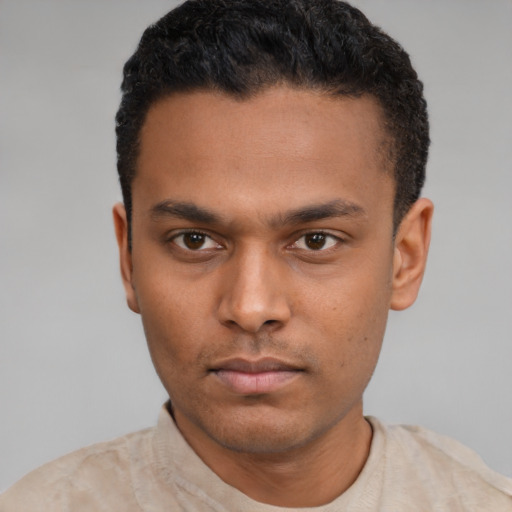 Neutral latino young-adult male with short  black hair and brown eyes