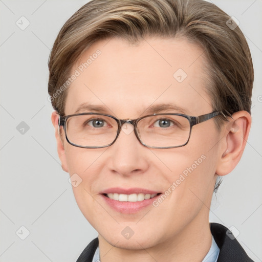 Joyful white adult female with short  brown hair and grey eyes