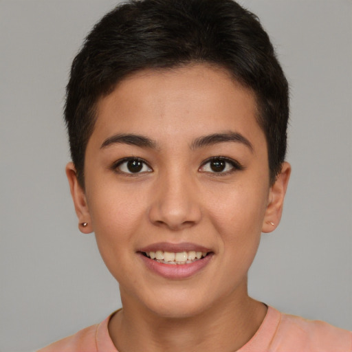 Joyful asian young-adult female with short  brown hair and brown eyes