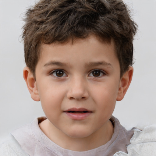 Joyful white child male with short  brown hair and brown eyes