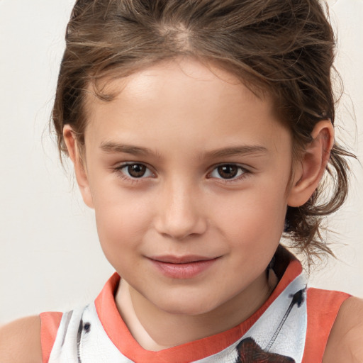 Joyful white child female with medium  brown hair and brown eyes