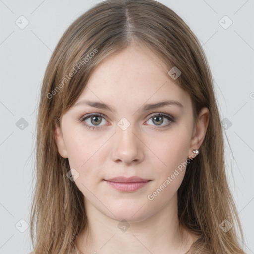 Joyful white young-adult female with long  brown hair and grey eyes