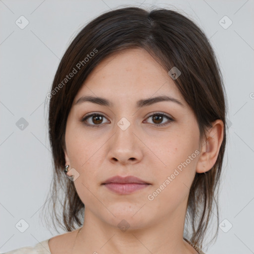 Neutral white young-adult female with medium  brown hair and brown eyes