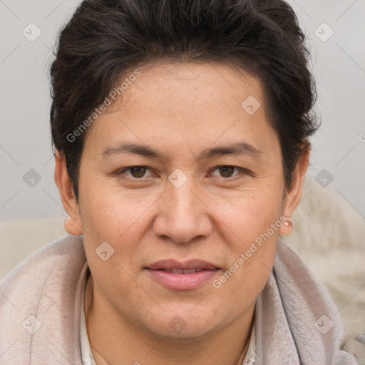 Joyful white adult female with short  brown hair and brown eyes