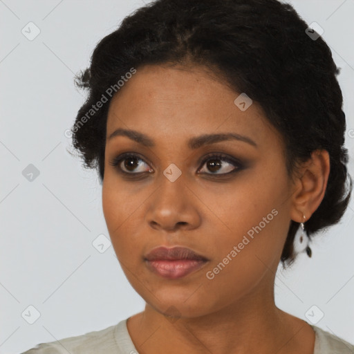 Neutral black young-adult female with short  black hair and brown eyes