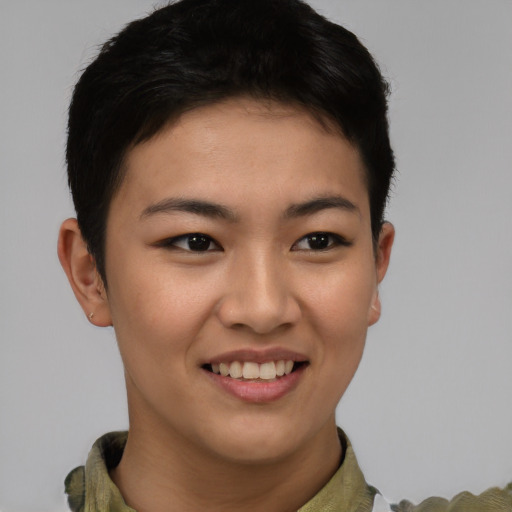 Joyful asian young-adult female with short  brown hair and brown eyes