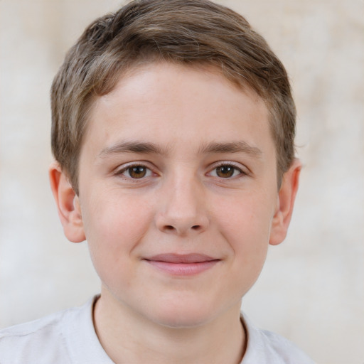 Joyful white child male with short  brown hair and brown eyes