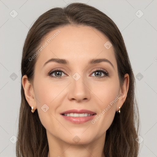 Joyful white young-adult female with long  brown hair and grey eyes