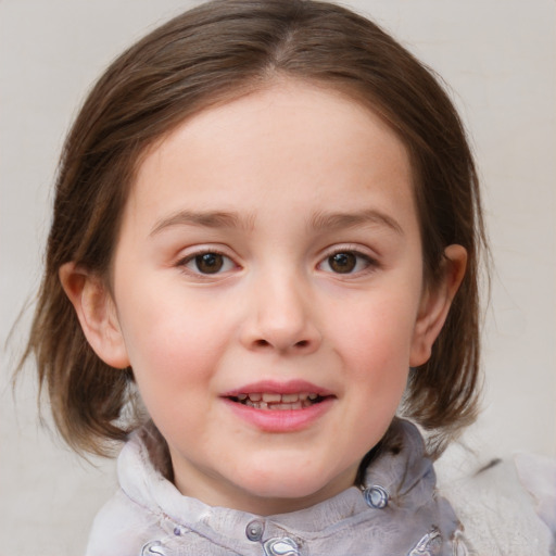 Joyful white child female with medium  brown hair and blue eyes